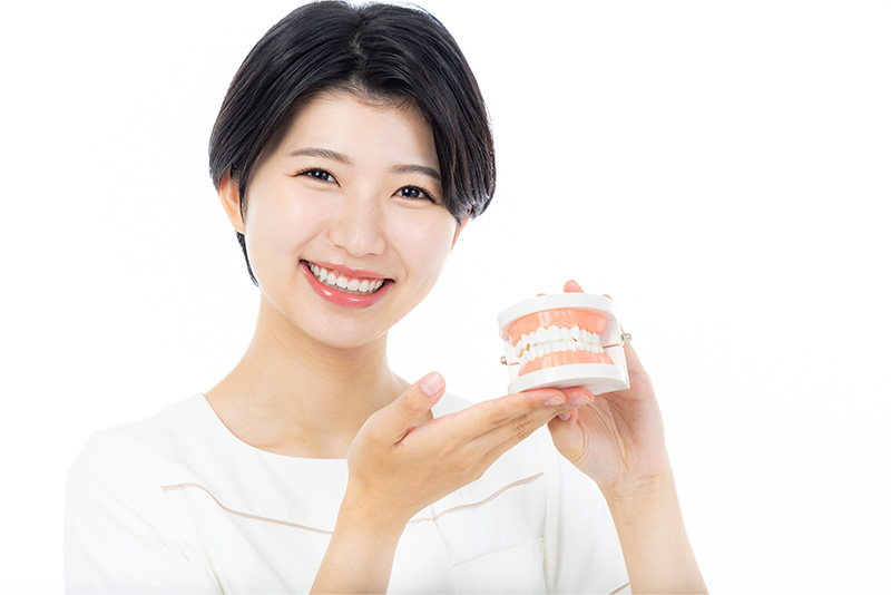 美しい口元で、より魅力的な笑顔を。「見た目」と「機能性」を両立させた治療